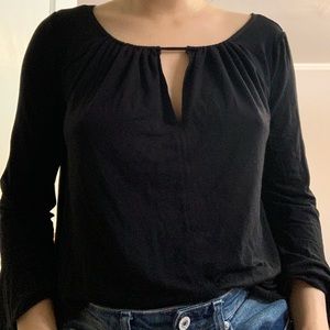 Black bat winged sleeved top